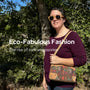 Woman carrying eco-fashion accessories: cork bag and wearing floating cork sunglasses.