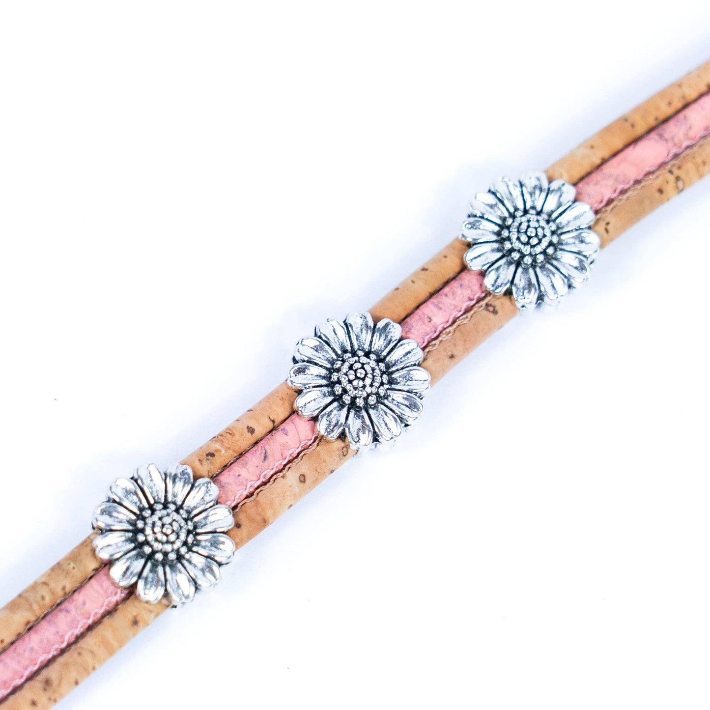 Close up of cork bracelet with chrysanthemum accents from Texas Cork Company