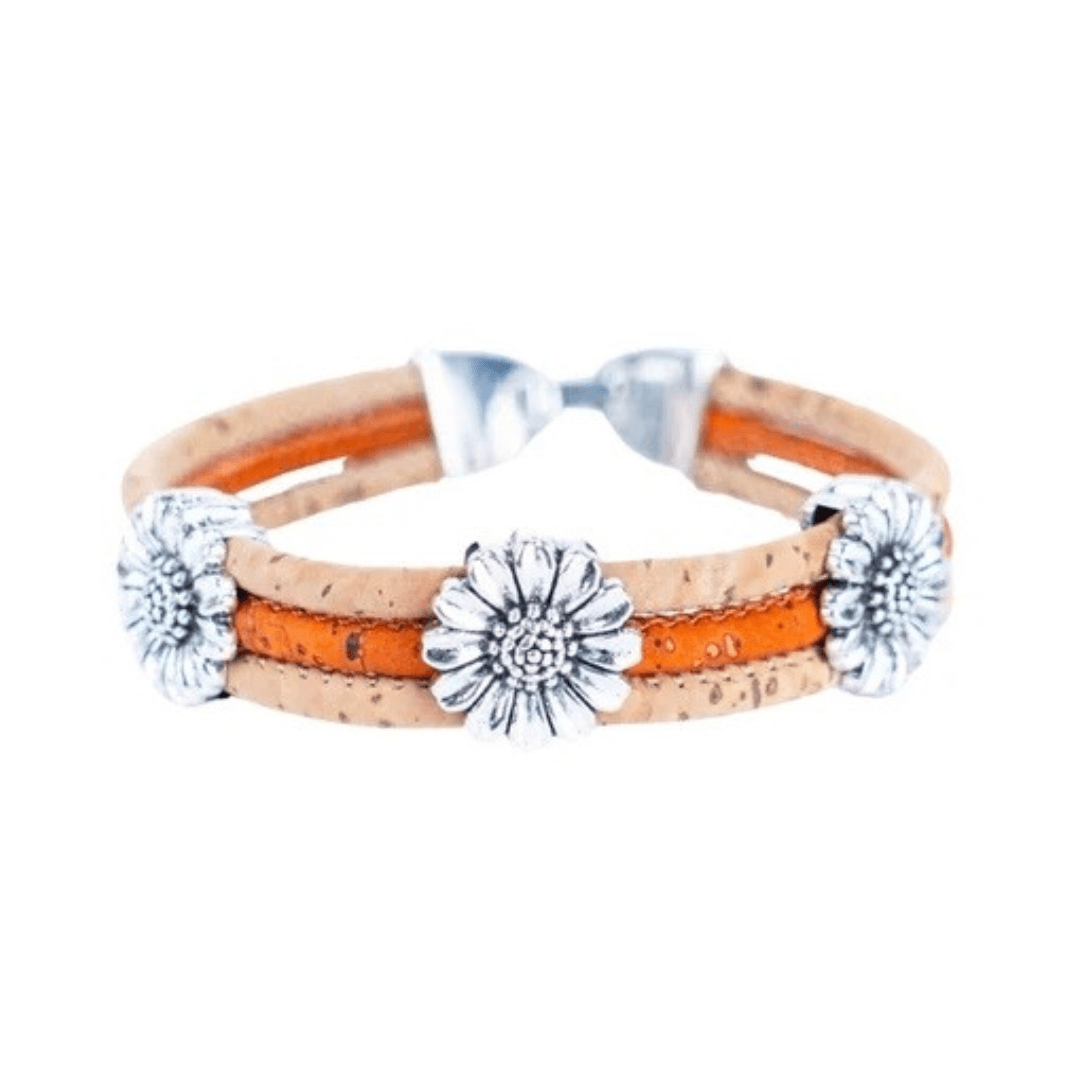 Front of orange cork bracelet with chrysanthemum accents from Texas Cork Company