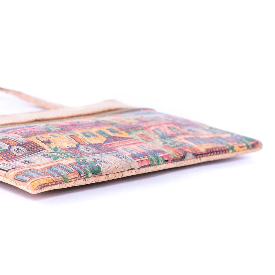 Angled view of eco cork crossbody clutch showing bottom of bag