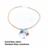 Necklace with a tree of life pendant on a white background with dimensions