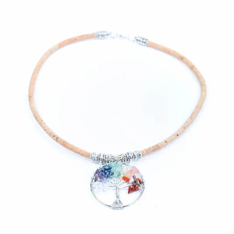 Necklace with a tree of life pendant featuring colorful stones on a white background