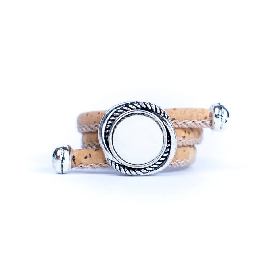Cork ring with white stone charm.
