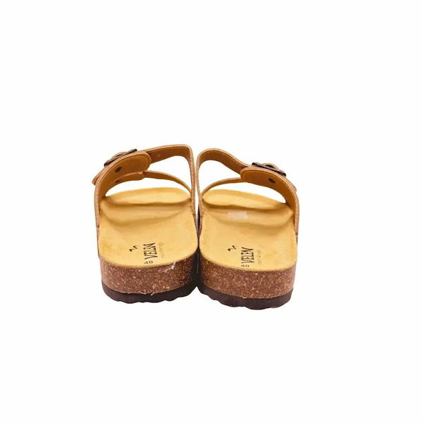 Pair of brown tow-strap sandals with cork sole on a white background - back view