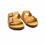 Pair of tan two-strap sandals with buckle straps on a white background