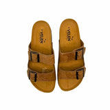 Pair of brown two-strap cork sandals with black buckles on a white background - top view