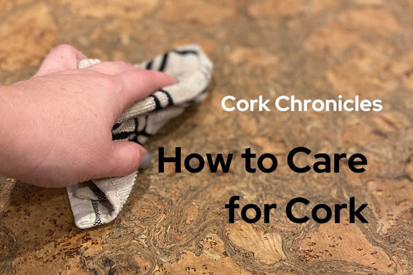Person cleaning a cork placemat.