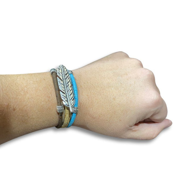3 Layer Cork Cord bracelet with Feather Charm on wrist from Texas Cork Company