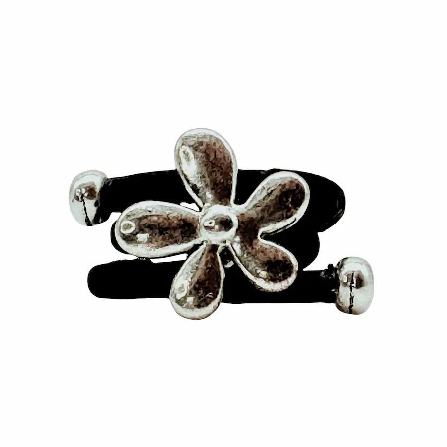 Iconic 70s flower charm on black cork cord ring