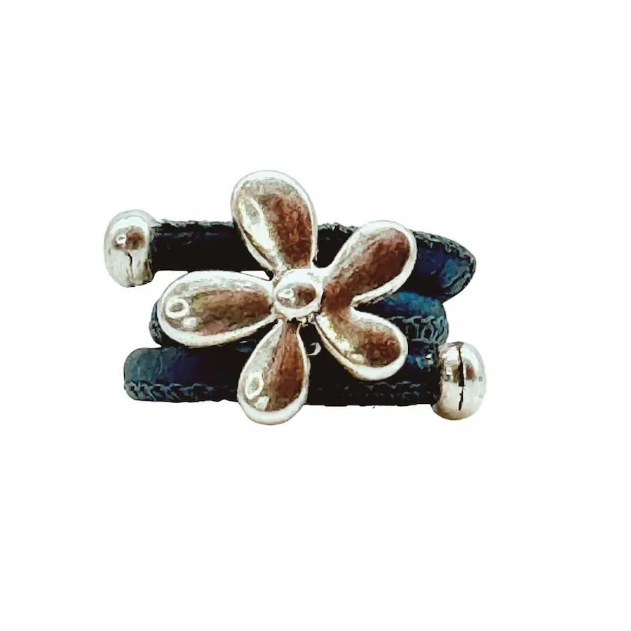 Iconic 70s flower charm on  blue cork cord ring