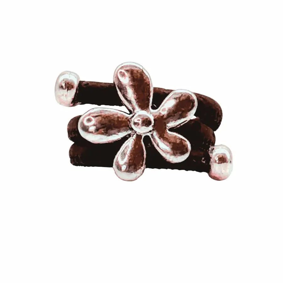 Iconic 70s flower charm on brown cork cord ring