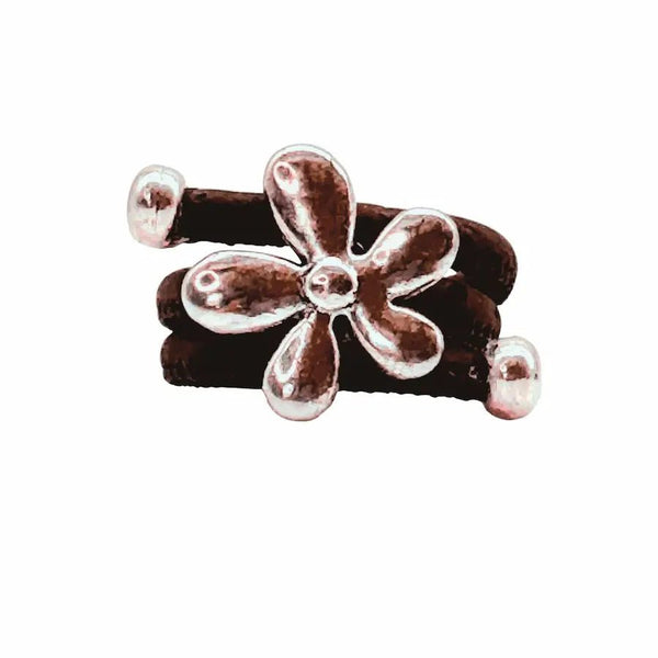 Iconic 70s flower charm on brown cork cord ring