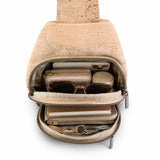 Albany Cork Sling Bag loaded with phone wallet, sunglasses, notebook, keys, zipper pouch, and makeup