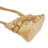 Bottom and side of three-line zipper cork crossbody bag from Texas Cork Company