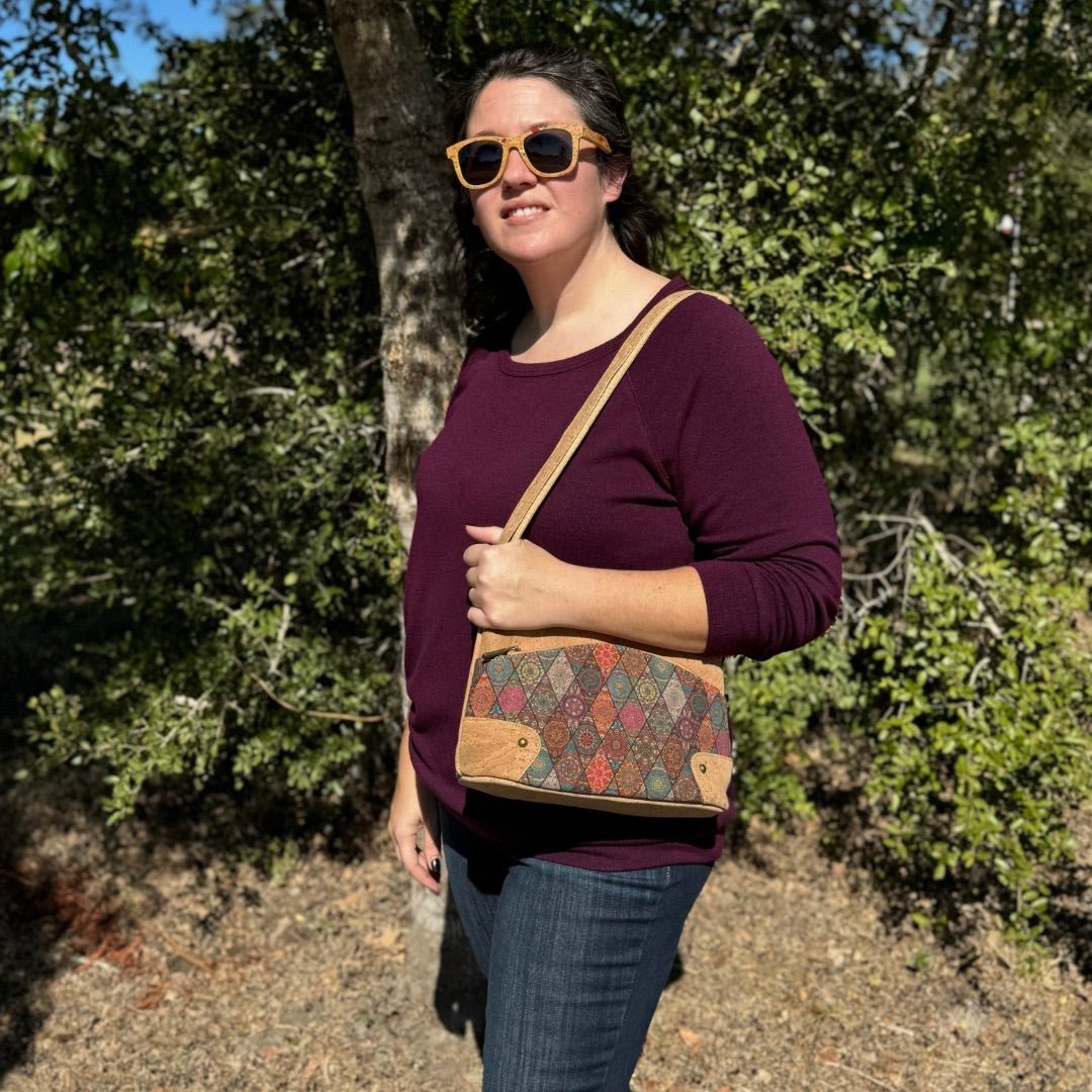 Woman carrying Eco Chic Three-Line Zipper Cork Crossbody in Traditional pattern