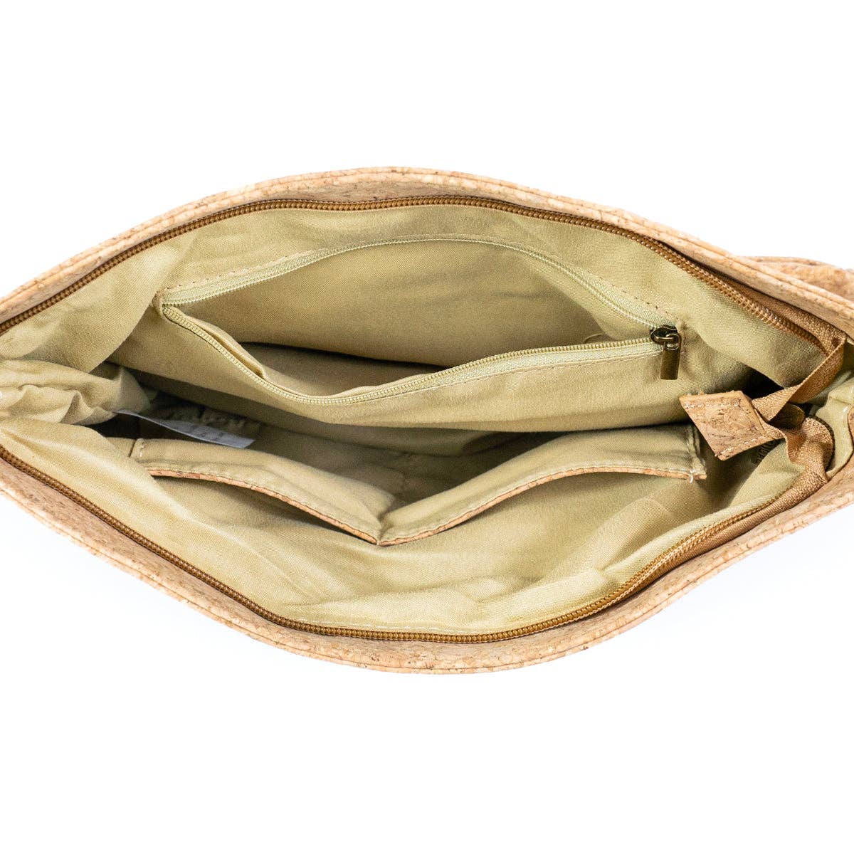 Inside view of Natural Cork Women’s Crossbody shows zip pocket and 2 slip pockets - from Texas Cork Company