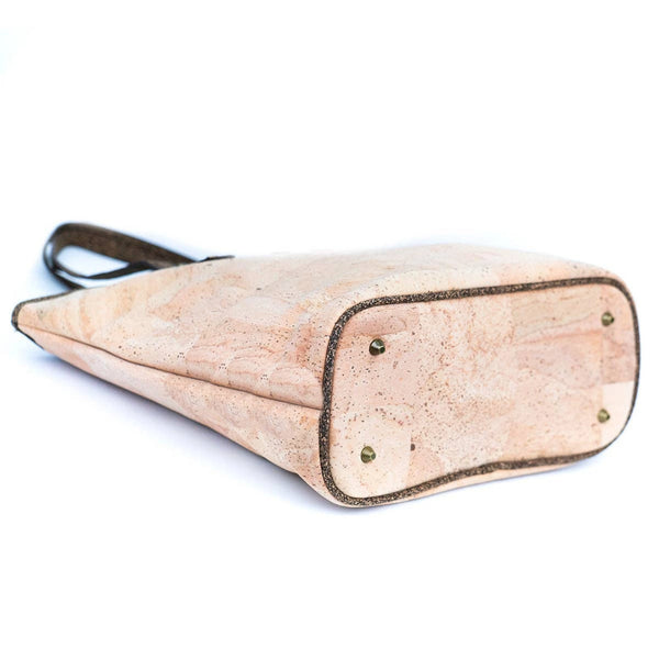 Bottom view with purse feet of Kona Cork Tote Bag on a white background