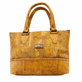 Front view of convertible crossbody bag with hand straps in Napa Luxe style and Bright Grey color