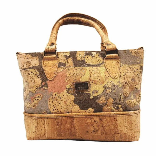 Front view of convertible crossbody bag with hand straps in Napa Luxe style and Flamingo color