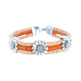 Front of orange cork bracelet with chrysanthemum accents from Texas Cork Company