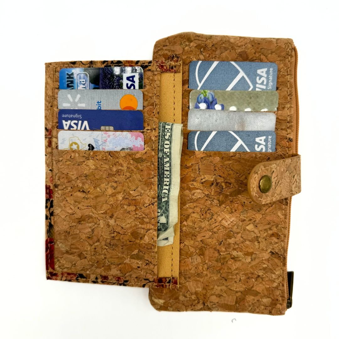 Slim cork card wallet with cards and money in the interior from Texas Cork Company