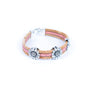 Top and side of cork bracelet with chrysanthemum accents from Texas Cork Company