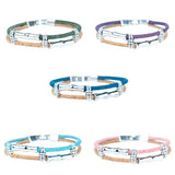 Group of Unisex cork everyday bracelets from Texas Cork Co showing Olive Green, Purple, Royal Blue, Light Blue, and Pink