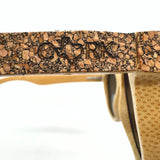 Detail of the cork and bamboo frame on polarized floating sunglasses by Texas Cork Company