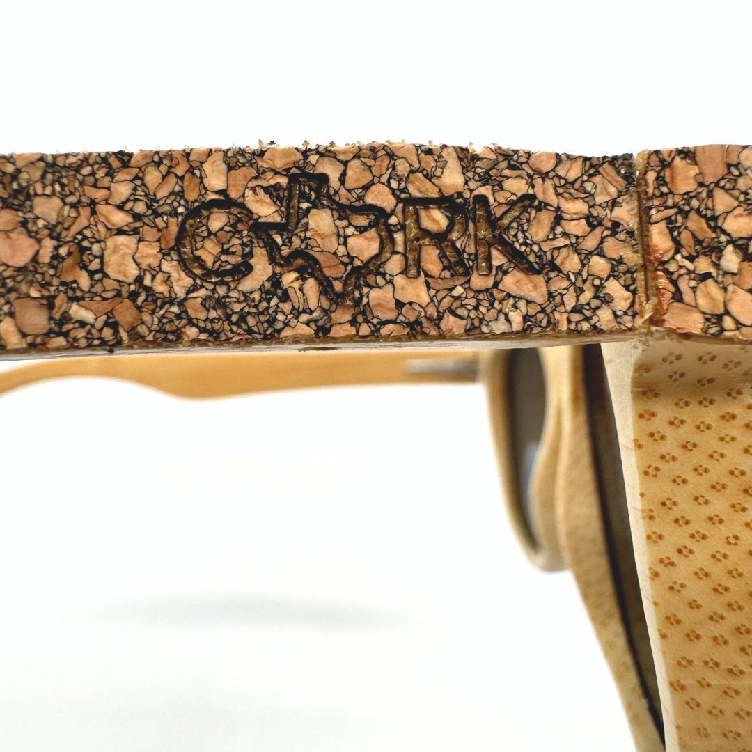 Detail of the cork and bamboo frame on polarized floating sunglasses by Texas Cork Company