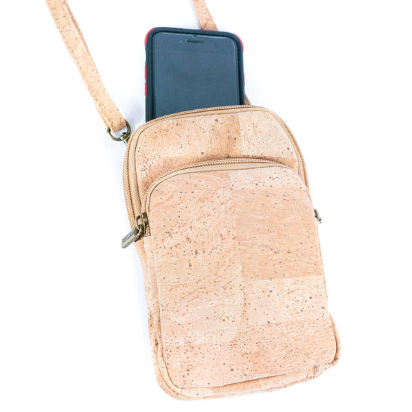 Women's Natural Cork Phone Bag with phone in it from Texas Cork Company