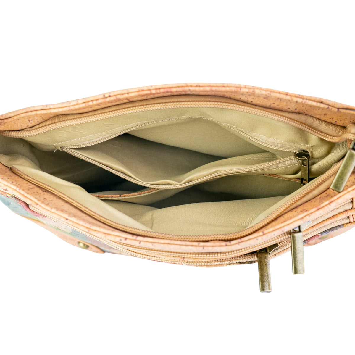 Open view of the Arlington cork crossbody bag made from cork material, showing a light beige fabric interior with slip pocket and zip compartments and metal zipper pulls on a white background.