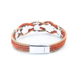 A multi-strand wrap bracelet featuring orange and tan cork cords, silver-tone floral charms, and a silver-tone magnetic clasp, shown on a plain white background. Back view.