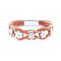 A multi-strand wrap bracelet featuring orange and tan cork cords, silver-tone floral charms, and a silver-tone magnetic clasp, shown on a plain white background.