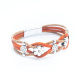 A multi-strand wrap bracelet featuring orange and tan cork cords, silver-tone floral charms, and a silver-tone magnetic clasp, shown on a plain white background. Side view.
