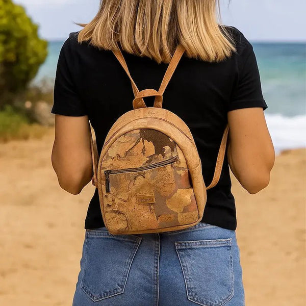 Aspen Mini backpack on woman at the beach
