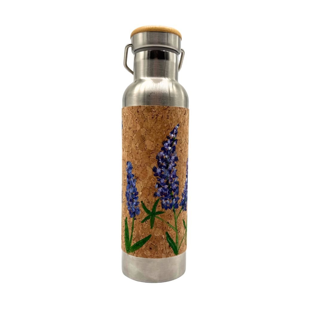 Hand painted bluebonnets on the front of the cork wrapped stainless steel water bottle by Texas Cork Company