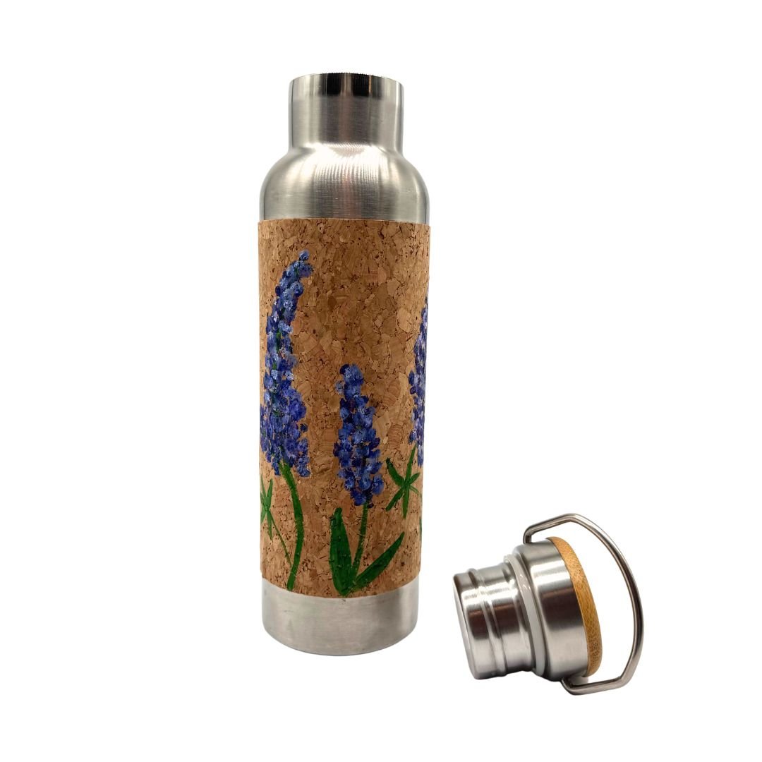 Hand painted bluebonnets on the front of the cork wrapped stainless steel water bottle with the screw top bamboo lid removed by Texas Cork Company