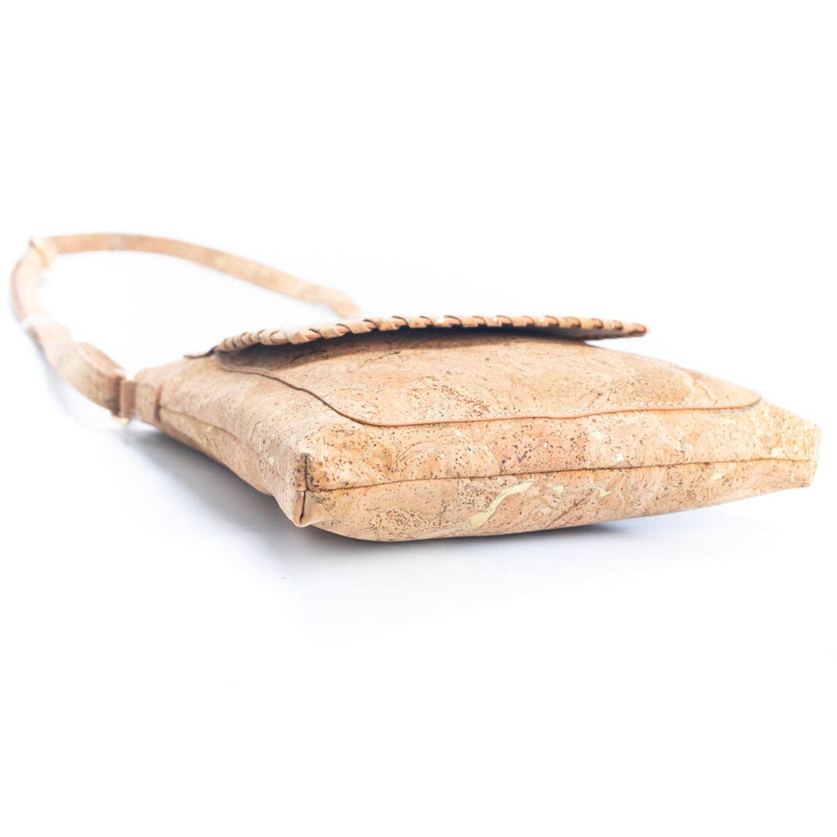 Bottom of molten gold cork shoulder bag with metallic accents from Texas Cork Company