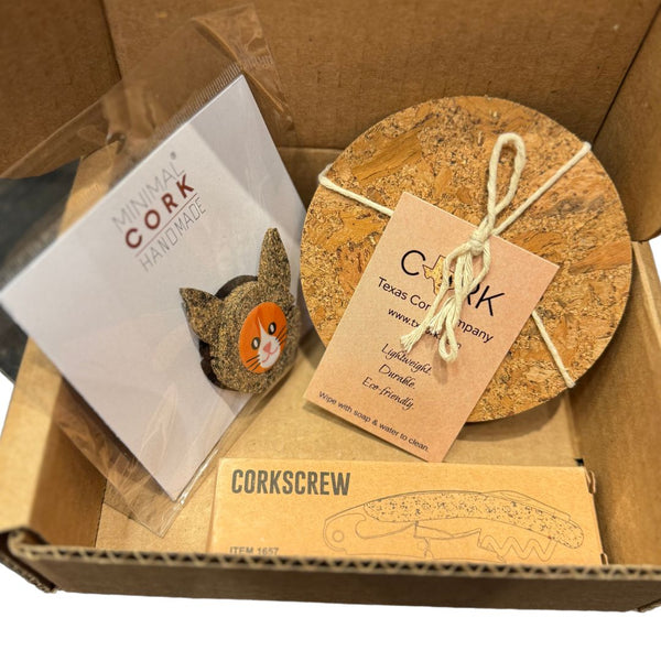 Bundle of 4 coasters, one drip stop, and one corkscrew in box from Texas Cork Company