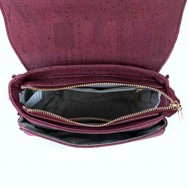 Brooklyn black cork crossbody with flap open showing front and main compartments
