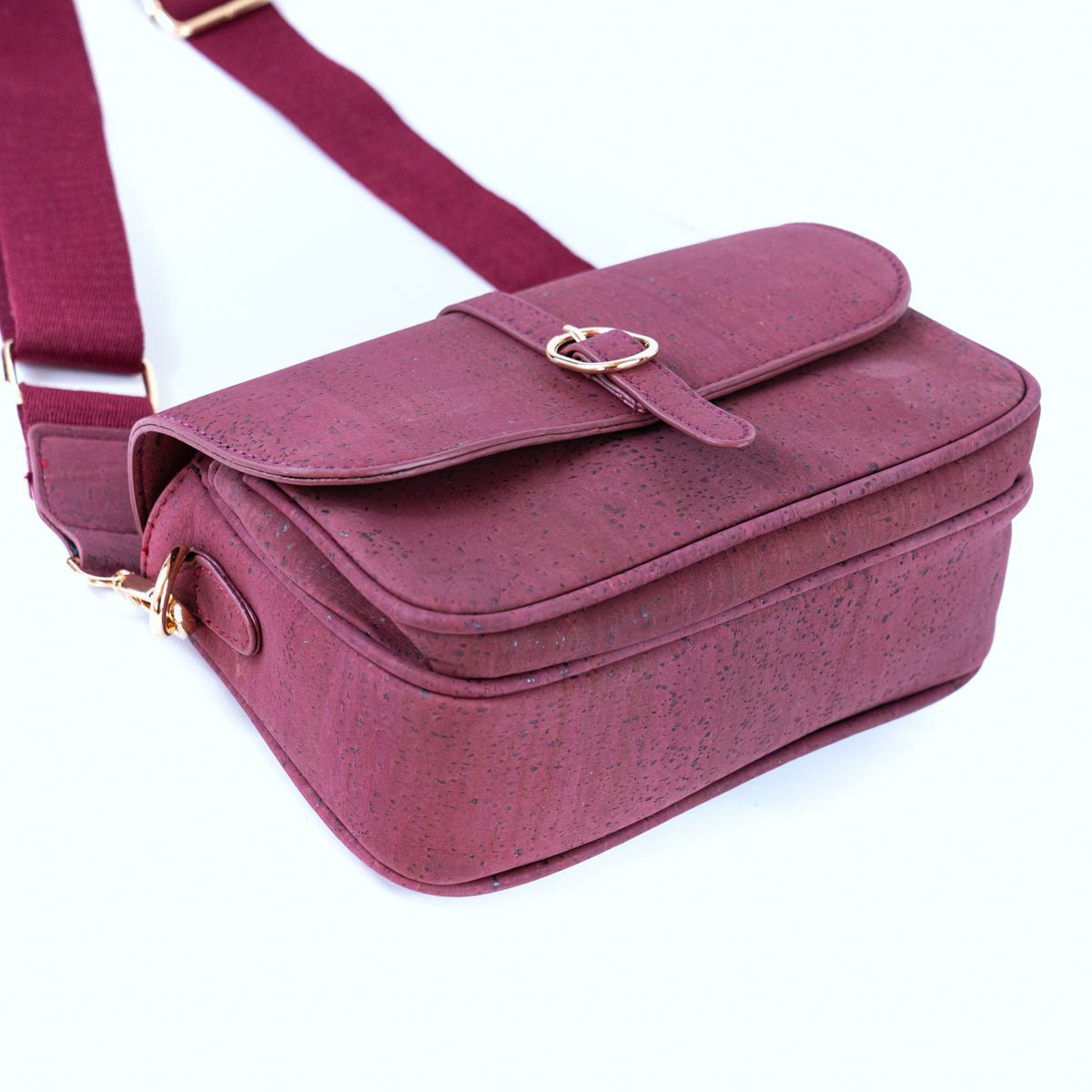 Side and bottom view of structured Brooklyn cork crossbody bag