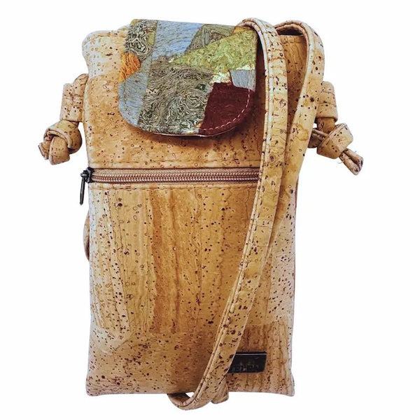 Cork cell phone bag with a patchwork flap on a white background