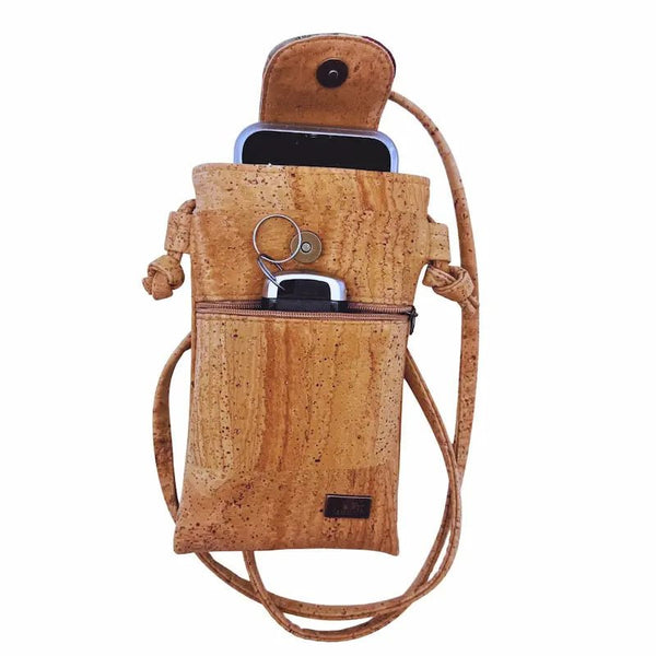 Cork cell phone bag with strap on a white background