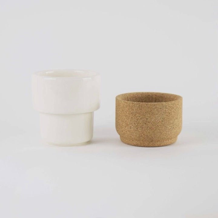 Ceramic mug with removable bottom beside it from Texas Cork Company