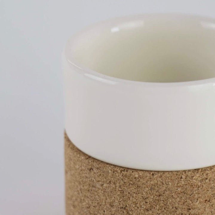 Close up of cream ceramic mug with removable cork bottom from Texas Cork Company