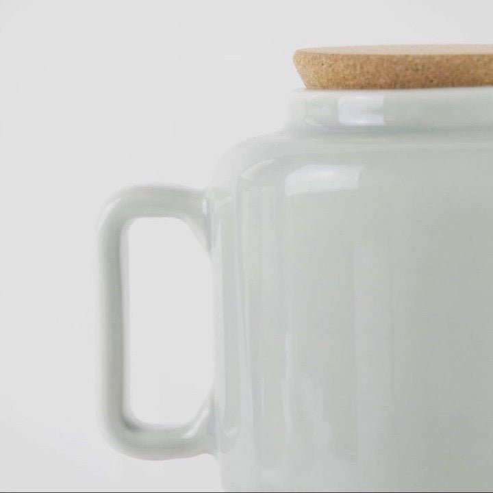 Close up of tea pot handle and cork stopper on top from Texas Cork Company