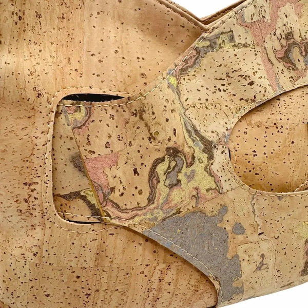 Chicago mid-sized crossbody closeup showing details of cross-cut decorations