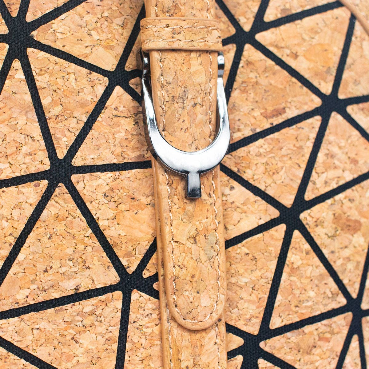 Close up of buckle and geometric pattern of Geometric Convertible Purse from Texas Cork Company