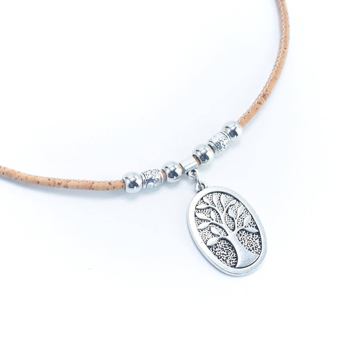 Closeup of Tree of Life Cork Necklace from Texas Cork Company