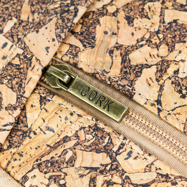 Closeup of cork and zipper on coffee cork chest sling travel bag from Texas Cork Company